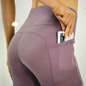 NYL women’s bike shorts with pockets purple size XL